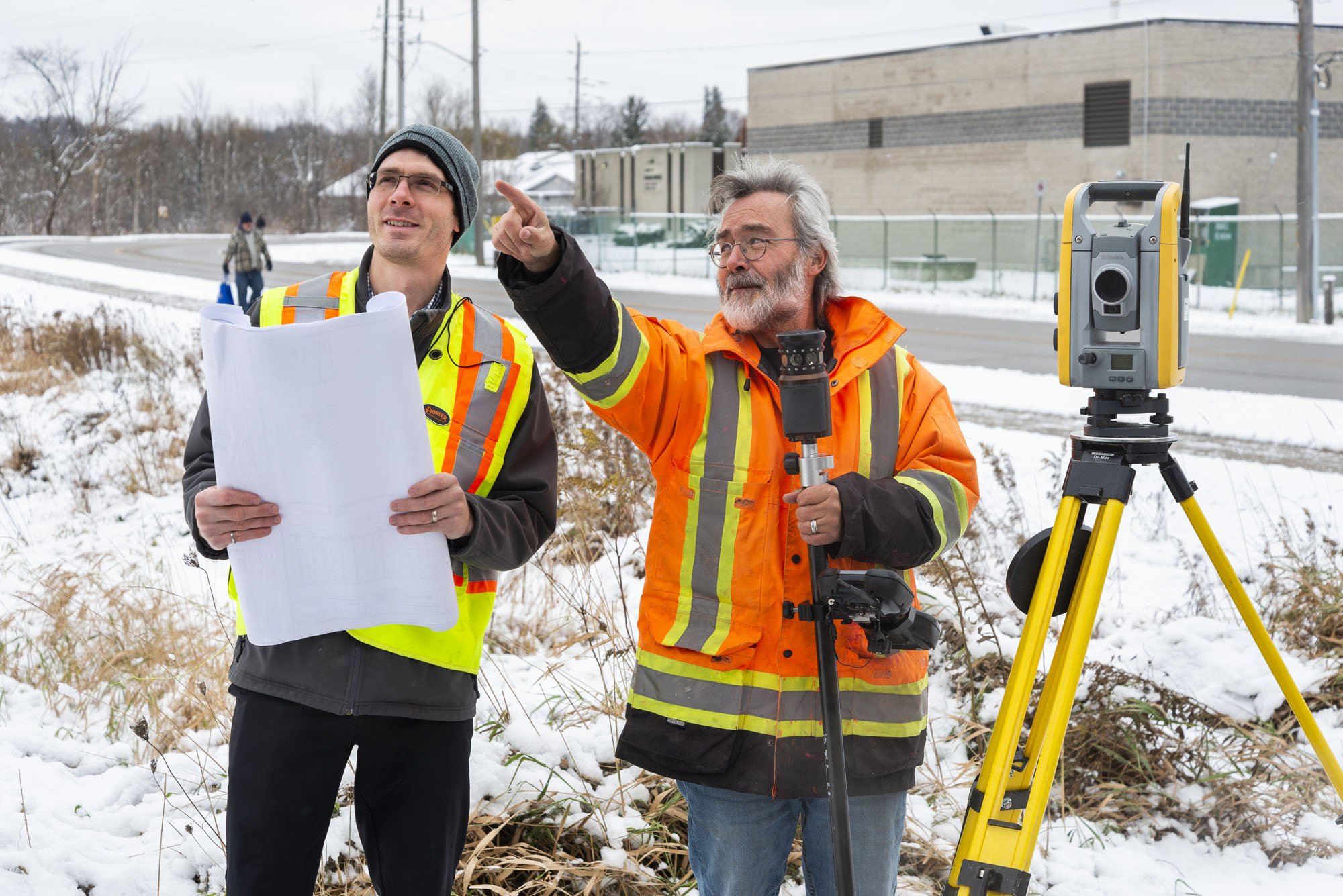 Two men surveying an area